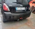 Чорний Кіа Ріо, об'ємом двигуна 1.4 л та пробігом 230 тис. км за 5179 $, фото 1 на Automoto.ua