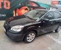 Чорний Кіа Ріо, об'ємом двигуна 1.4 л та пробігом 230 тис. км за 5179 $, фото 5 на Automoto.ua