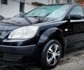 Черный Киа Рио, объемом двигателя 1.4 л и пробегом 218 тыс. км за 4600 $, фото 1 на Automoto.ua