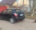 Чорний Кіа Ріо, об'ємом двигуна 1.4 л та пробігом 180 тис. км за 6000 $, фото 1 на Automoto.ua