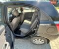 Черный Киа Рио, объемом двигателя 1.4 л и пробегом 134 тыс. км за 5300 $, фото 4 на Automoto.ua