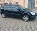 Черный Киа Рио, объемом двигателя 1.4 л и пробегом 181 тыс. км за 3850 $, фото 2 на Automoto.ua