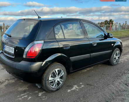 Чорний Кіа Ріо, об'ємом двигуна 1.4 л та пробігом 220 тис. км за 4399 $, фото 3 на Automoto.ua