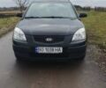 Черный Киа Рио, объемом двигателя 1.4 л и пробегом 220 тыс. км за 4499 $, фото 2 на Automoto.ua