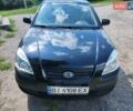 Черный Киа Рио, объемом двигателя 1.4 л и пробегом 235 тыс. км за 4800 $, фото 1 на Automoto.ua