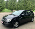 Черный Киа Рио, объемом двигателя 1.6 л и пробегом 228 тыс. км за 7400 $, фото 1 на Automoto.ua