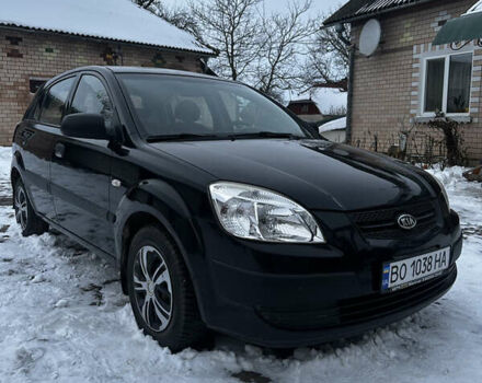 Чорний Кіа Ріо, об'ємом двигуна 1.4 л та пробігом 220 тис. км за 4400 $, фото 2 на Automoto.ua