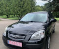 Чорний Кіа Ріо, об'ємом двигуна 1.6 л та пробігом 228 тис. км за 6900 $, фото 2 на Automoto.ua