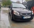 Черный Киа Рио, объемом двигателя 1.4 л и пробегом 230 тыс. км за 5234 $, фото 8 на Automoto.ua