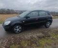 Черный Киа Рио, объемом двигателя 1.4 л и пробегом 220 тыс. км за 4499 $, фото 1 на Automoto.ua