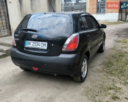 Чорний Кіа Ріо, об'ємом двигуна 1.4 л та пробігом 198 тис. км за 5200 $, фото 2 на Automoto.ua