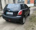 Чорний Кіа Ріо, об'ємом двигуна 1.4 л та пробігом 198 тис. км за 5200 $, фото 2 на Automoto.ua