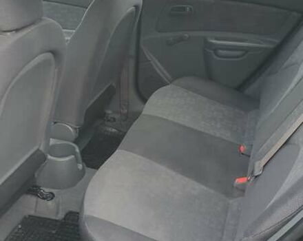 Черный Киа Рио, объемом двигателя 1.4 л и пробегом 220 тыс. км за 4499 $, фото 8 на Automoto.ua