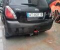 Чорний Кіа Ріо, об'ємом двигуна 1.4 л та пробігом 230 тис. км за 5238 $, фото 1 на Automoto.ua