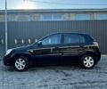 Черный Киа Рио, объемом двигателя 1.4 л и пробегом 87 тыс. км за 4850 $, фото 1 на Automoto.ua