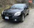 Чорний Кіа Ріо, об'ємом двигуна 1.4 л та пробігом 198 тис. км за 5200 $, фото 1 на Automoto.ua
