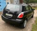 Черный Киа Рио, объемом двигателя 1.4 л и пробегом 227 тыс. км за 4800 $, фото 4 на Automoto.ua