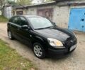 Черный Киа Рио, объемом двигателя 1.4 л и пробегом 227 тыс. км за 4800 $, фото 1 на Automoto.ua