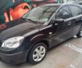 Чорний Кіа Ріо, об'ємом двигуна 1.4 л та пробігом 230 тис. км за 5248 $, фото 3 на Automoto.ua