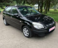 Черный Киа Рио, объемом двигателя 1.6 л и пробегом 228 тыс. км за 7100 $, фото 1 на Automoto.ua