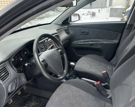 Черный Киа Рио, объемом двигателя 1.4 л и пробегом 220 тыс. км за 4500 $, фото 17 на Automoto.ua