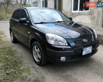 Чорний Кіа Ріо, об'ємом двигуна 1.4 л та пробігом 198 тис. км за 5200 $, фото 1 на Automoto.ua