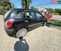 Черный Киа Рио, объемом двигателя 1.4 л и пробегом 134 тыс. км за 5300 $, фото 6 на Automoto.ua