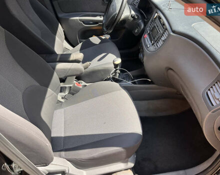 Черный Киа Рио, объемом двигателя 1.4 л и пробегом 174 тыс. км за 4200 $, фото 27 на Automoto.ua