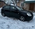 Черный Киа Рио, объемом двигателя 1.4 л и пробегом 220 тыс. км за 4500 $, фото 1 на Automoto.ua