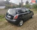 Черный Киа Рио, объемом двигателя 1.4 л и пробегом 260 тыс. км за 3450 $, фото 6 на Automoto.ua