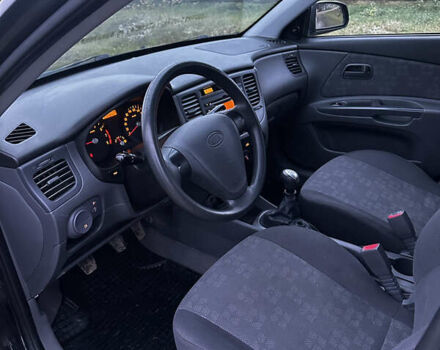 Черный Киа Рио, объемом двигателя 1.4 л и пробегом 220 тыс. км за 4499 $, фото 14 на Automoto.ua