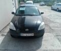 Черный Киа Рио, объемом двигателя 1.4 л и пробегом 250 тыс. км за 3421 $, фото 2 на Automoto.ua