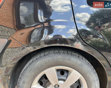 Черный Киа Рио, объемом двигателя 1.4 л и пробегом 174 тыс. км за 4200 $, фото 11 на Automoto.ua