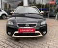 Чорний Кіа Ріо, об'ємом двигуна 1.5 л та пробігом 265 тис. км за 4700 $, фото 1 на Automoto.ua