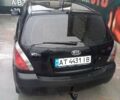 Чорний Кіа Ріо, об'ємом двигуна 1.4 л та пробігом 230 тис. км за 5248 $, фото 2 на Automoto.ua