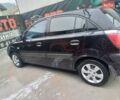 Чорний Кіа Ріо, об'ємом двигуна 1.4 л та пробігом 230 тис. км за 5248 $, фото 4 на Automoto.ua