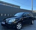 Черный Киа Рио, объемом двигателя 1.4 л и пробегом 87 тыс. км за 4850 $, фото 1 на Automoto.ua