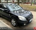 Чорний Кіа Ріо, об'ємом двигуна 1.4 л та пробігом 192 тис. км за 4500 $, фото 1 на Automoto.ua