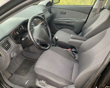 Черный Киа Рио, объемом двигателя 1.4 л и пробегом 98 тыс. км за 6200 $, фото 3 на Automoto.ua