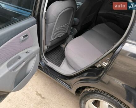 Чорний Кіа Ріо, об'ємом двигуна 1.4 л та пробігом 198 тис. км за 5200 $, фото 5 на Automoto.ua