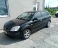 Черный Киа Рио, объемом двигателя 1.4 л и пробегом 250 тыс. км за 3421 $, фото 1 на Automoto.ua