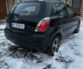 Черный Киа Рио, объемом двигателя 1.4 л и пробегом 220 тыс. км за 4500 $, фото 4 на Automoto.ua