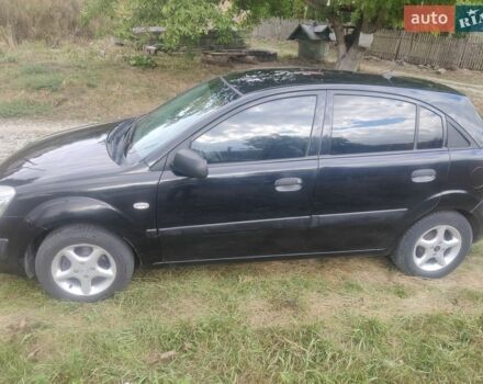 Черный Киа Рио, объемом двигателя 1.4 л и пробегом 260 тыс. км за 3450 $, фото 3 на Automoto.ua