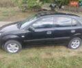 Черный Киа Рио, объемом двигателя 1.4 л и пробегом 260 тыс. км за 3450 $, фото 3 на Automoto.ua