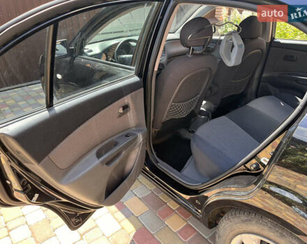 Черный Киа Рио, объемом двигателя 1.4 л и пробегом 174 тыс. км за 4200 $, фото 21 на Automoto.ua