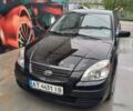 Чорний Кіа Ріо, об'ємом двигуна 1.4 л та пробігом 230 тис. км за 5248 $, фото 1 на Automoto.ua