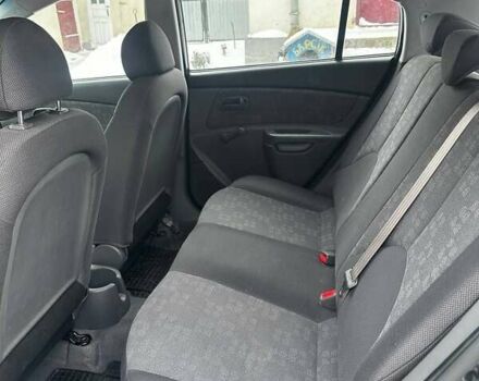 Черный Киа Рио, объемом двигателя 1.4 л и пробегом 220 тыс. км за 4500 $, фото 16 на Automoto.ua