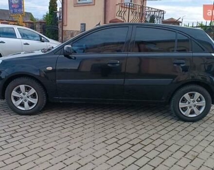 Черный Киа Рио, объемом двигателя 1.4 л и пробегом 181 тыс. км за 3850 $, фото 26 на Automoto.ua