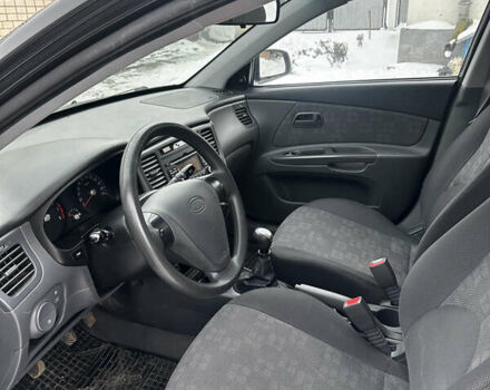 Чорний Кіа Ріо, об'ємом двигуна 1.4 л та пробігом 220 тис. км за 4400 $, фото 13 на Automoto.ua