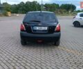 Черный Киа Рио, объемом двигателя 1.4 л и пробегом 181 тыс. км за 3850 $, фото 43 на Automoto.ua